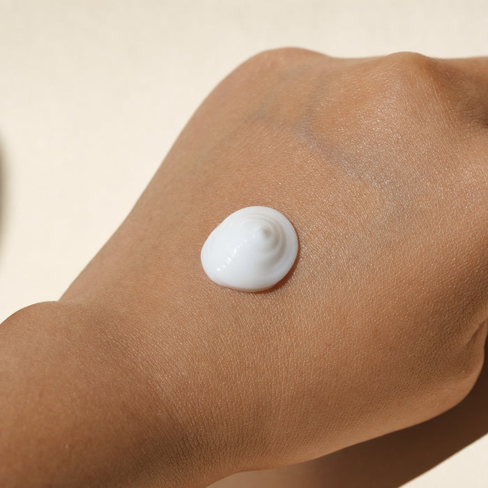 A pea-sized dab of Intertrigo Relief Cream on the back of a hand