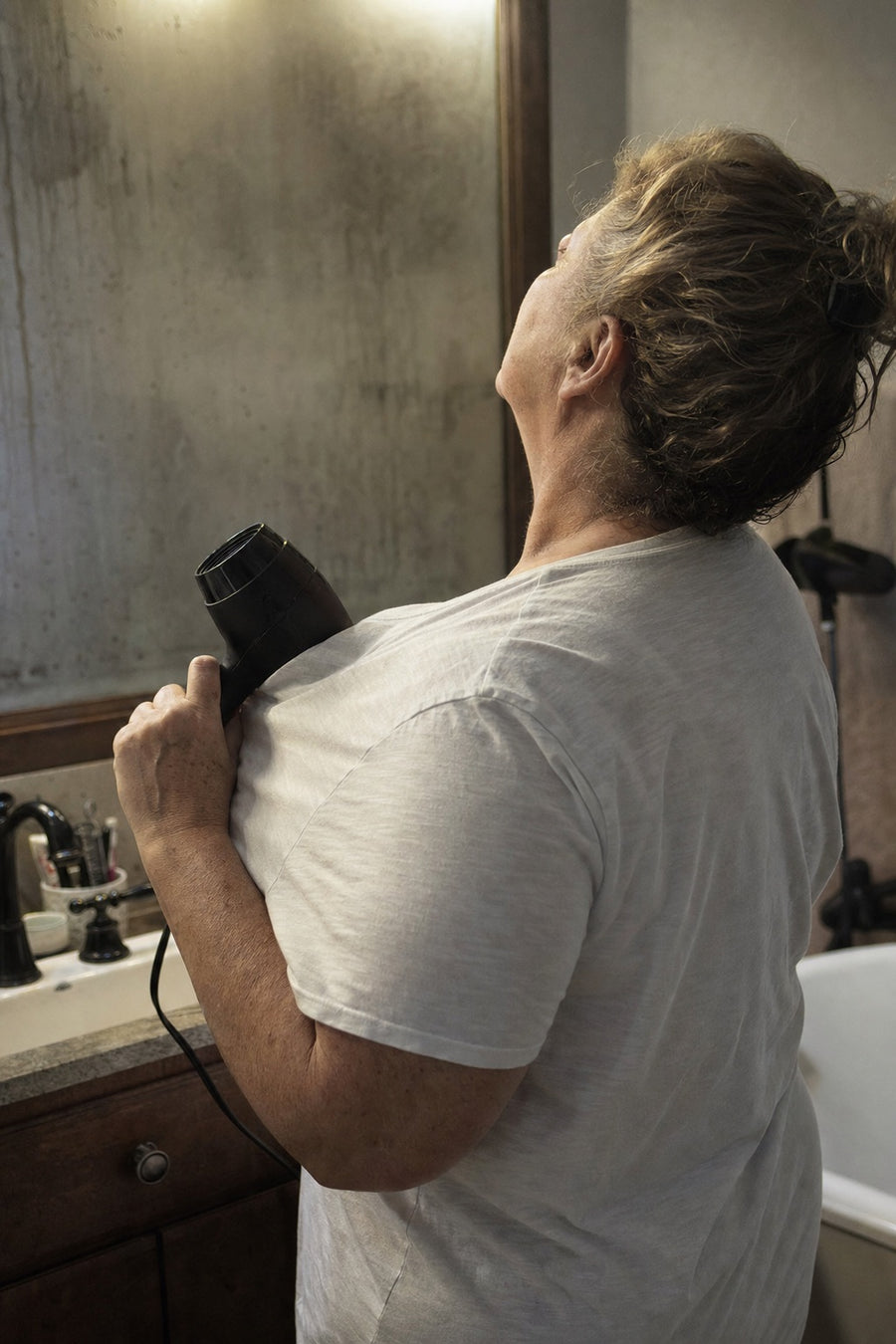 A hair dryer on cool aimed under a shirt, an exhausting nightly ritual